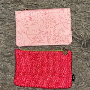 Pink Floral and hot pink Ipsy makeup bags